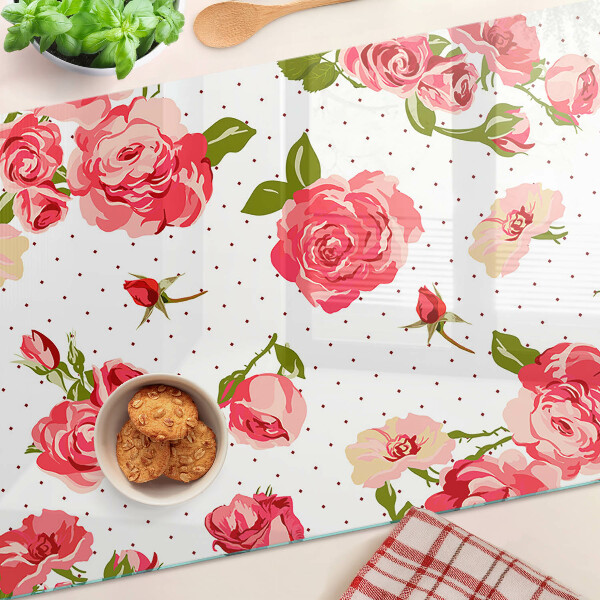 Tagliere in vetro con motivo di rose su sfondo bianco