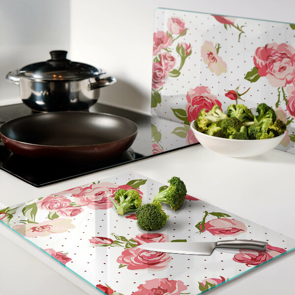 Tagliere in vetro con motivo di rose su sfondo bianco