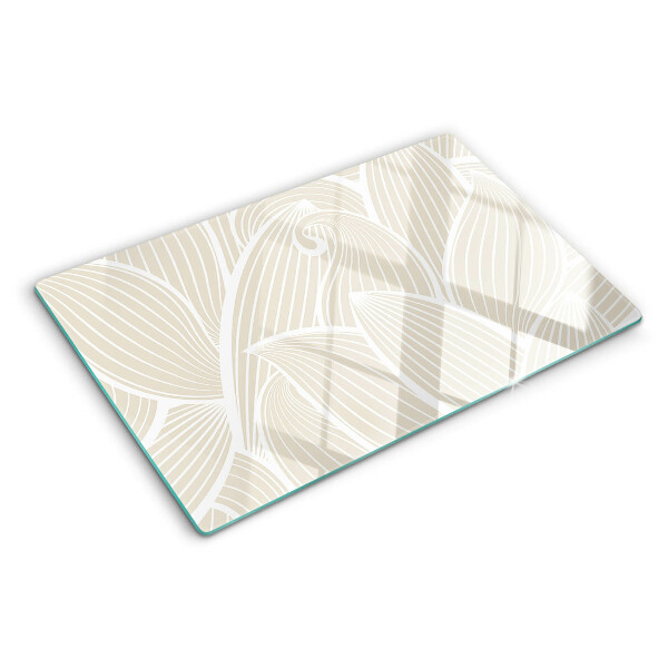 Tagliere in vetro con motivo di foglie in una grafica delicata