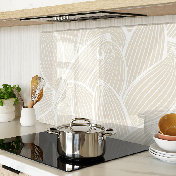 Tagliere in vetro con motivo di foglie in una grafica delicata