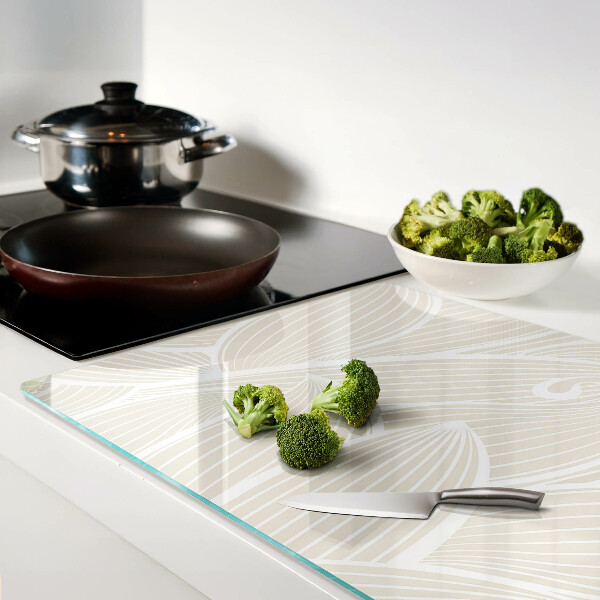 Tagliere in vetro con motivo di foglie in una grafica delicata