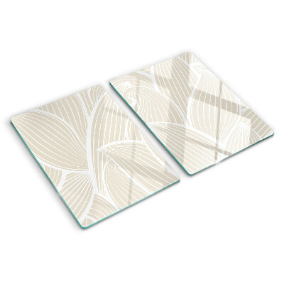 Tagliere in vetro con motivo di foglie in una grafica delicata