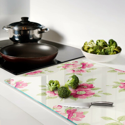 Tagliere in vetro con motivo floreale nei toni del rosa