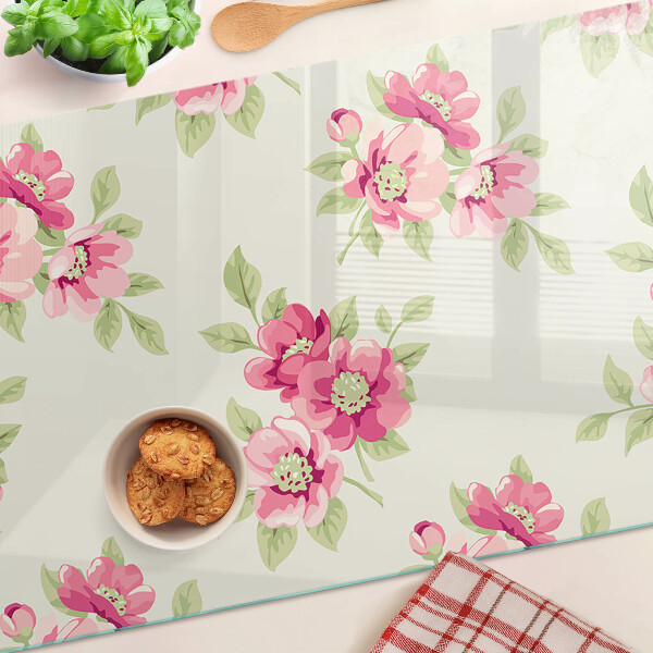 Tagliere in vetro con motivo floreale nei toni del rosa