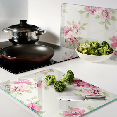 Tagliere in vetro con motivo floreale nei toni del rosa