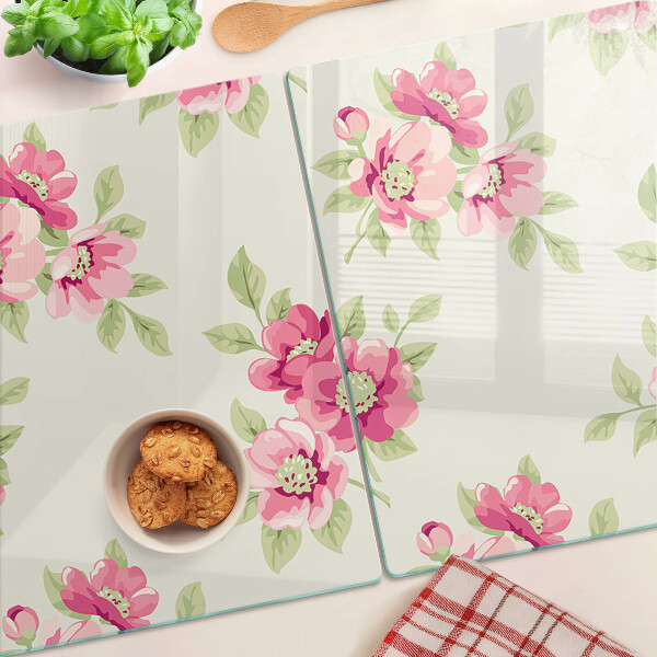 Tagliere in vetro con motivo floreale nei toni del rosa