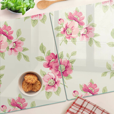 Tagliere in vetro con motivo floreale nei toni del rosa