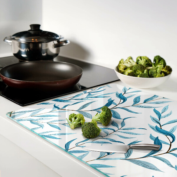 Tagliere in vetro temperato con motivo di foglie nei toni del blu