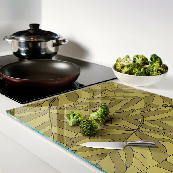 Tagliere in vetro con decorazione a foglie nei toni dell'oro