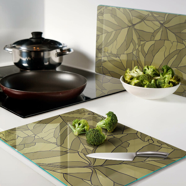 Tagliere in vetro con decorazione a foglie nei toni dell'oro