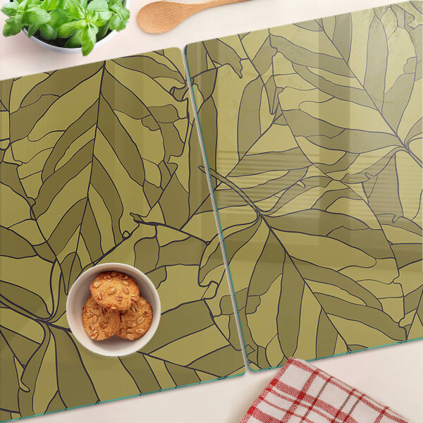 Tagliere in vetro con decorazione a foglie nei toni dell'oro