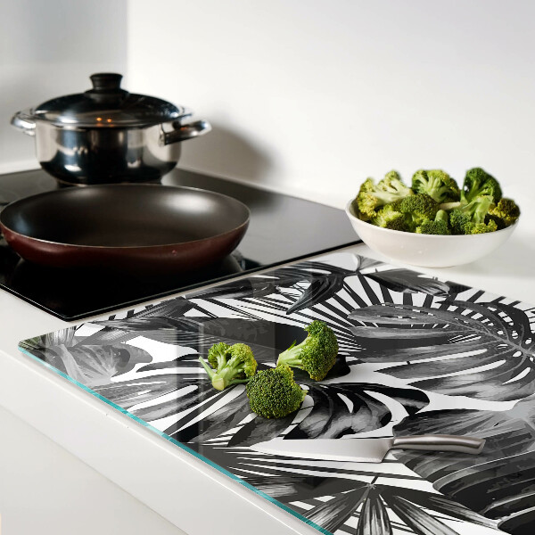 Tagliere in vetro con motivo di foglie tropicali in bianco e nero