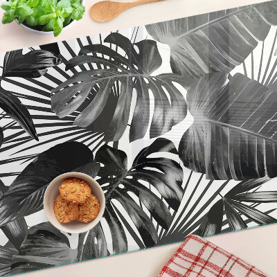 Tagliere in vetro con motivo di foglie tropicali in bianco e nero