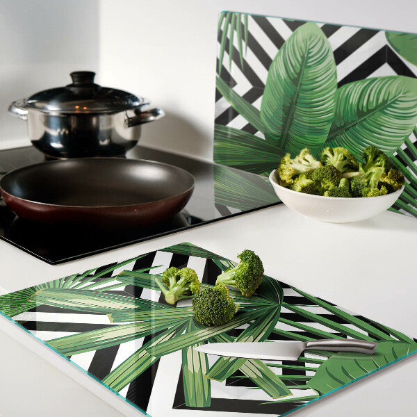 Tagliere in vetro temperato con motivi di foglie tropicali su strisce