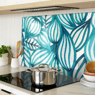 Tagliere in vetro con motivo di foglie nei toni del turchese