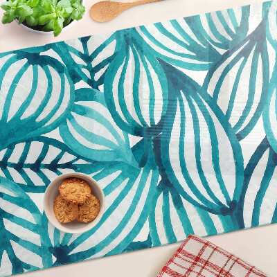 Tagliere in vetro con motivo di foglie nei toni del turchese