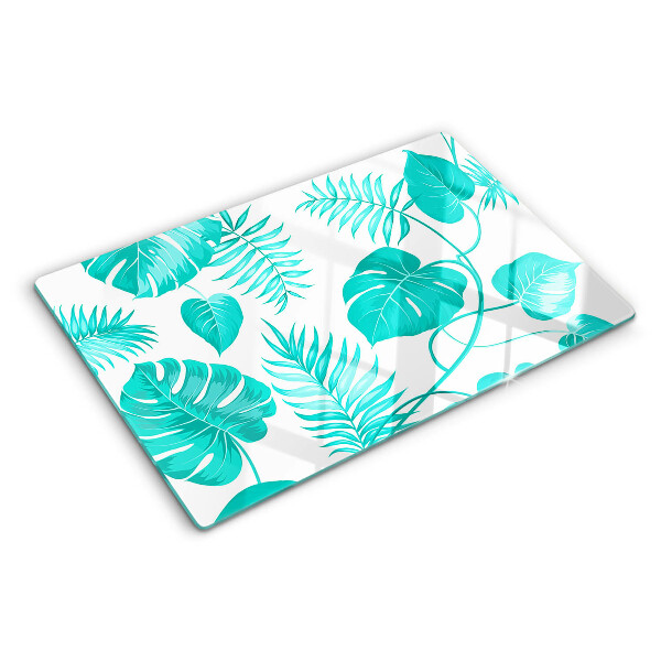 Tagliere in vetro con motivo di foglie tropicali nei toni del verde