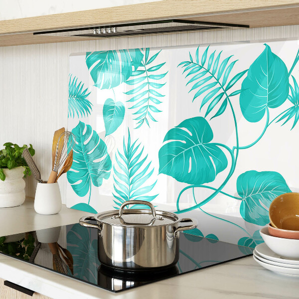 Tagliere in vetro con motivo di foglie tropicali nei toni del verde