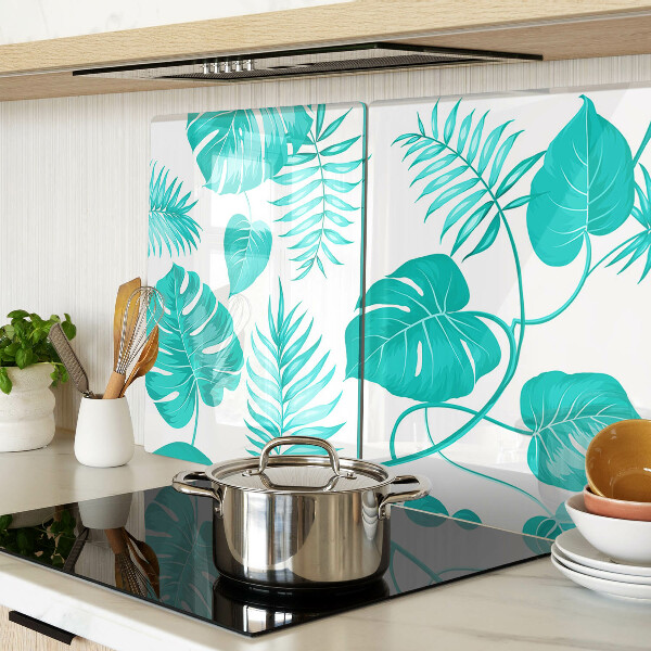 Tagliere in vetro con motivo di foglie tropicali nei toni del verde