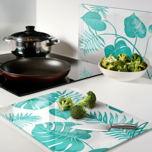 Tagliere in vetro con motivo di foglie tropicali nei toni del verde