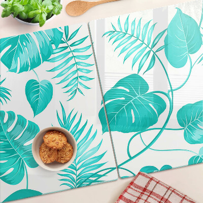 Tagliere in vetro con motivo di foglie tropicali nei toni del verde
