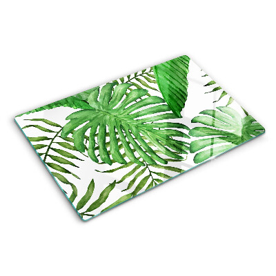 Tagliere in vetro temperato con motivo di foglie tropicali nei toni del verde