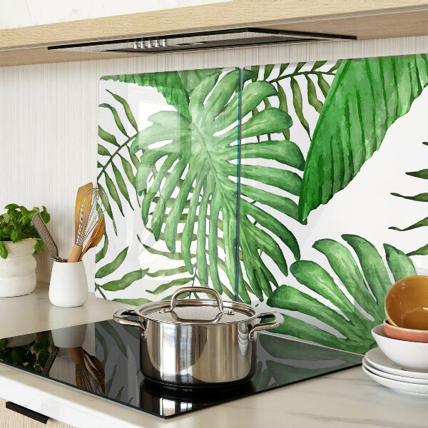 Tagliere in vetro temperato con motivo di foglie tropicali nei toni del verde