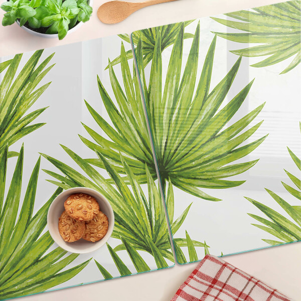 Tagliere in vetro temperato con motivo di foglie di palma nei toni del verde