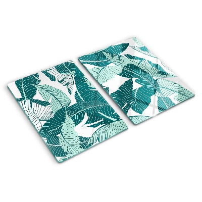 Tagliere in vetro con motivo di foglie tropicali nei toni del verde
