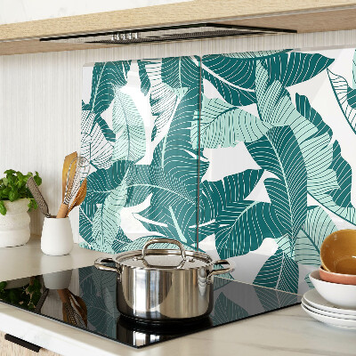 Tagliere in vetro con motivo di foglie tropicali nei toni del verde