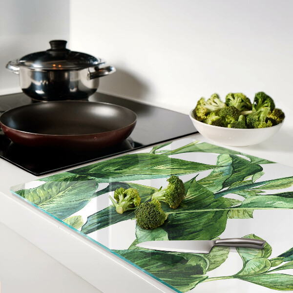 Tagliere in vetro temperato con motivo di foglie di piante tropicali