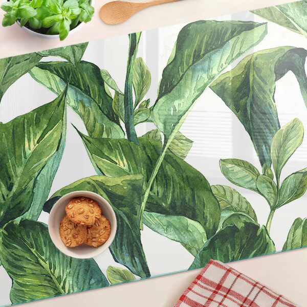 Tagliere in vetro temperato con motivo di foglie di piante tropicali