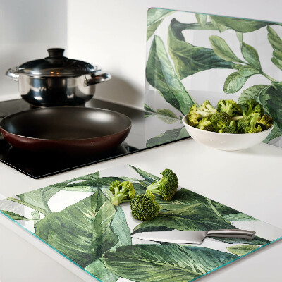 Tagliere in vetro temperato con motivo di foglie di piante tropicali