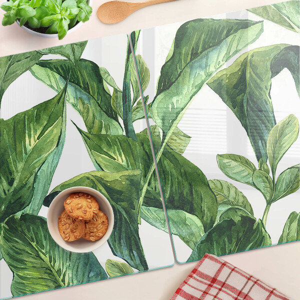 Tagliere in vetro temperato con motivo di foglie di piante tropicali