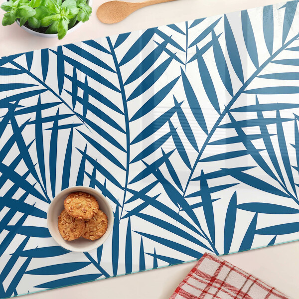 Tagliere in vetro con motivo di foglie di palma nei toni del blu