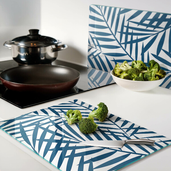 Tagliere in vetro con motivo di foglie di palma nei toni del blu