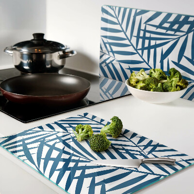 Tagliere in vetro con motivo di foglie di palma nei toni del blu