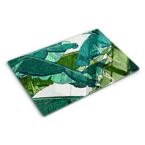 Tagliere in vetro con motivo di foglie di palma nei toni del verde