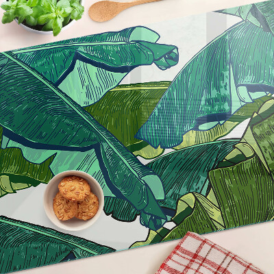 Tagliere in vetro con motivo di foglie di palma nei toni del verde