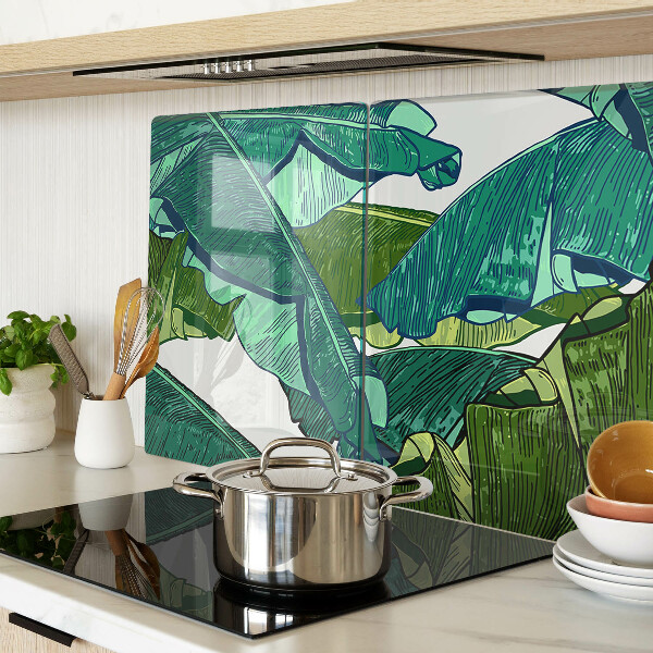 Tagliere in vetro con motivo di foglie di palma nei toni del verde
