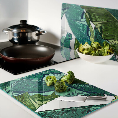 Tagliere in vetro con motivo di foglie di palma nei toni del verde