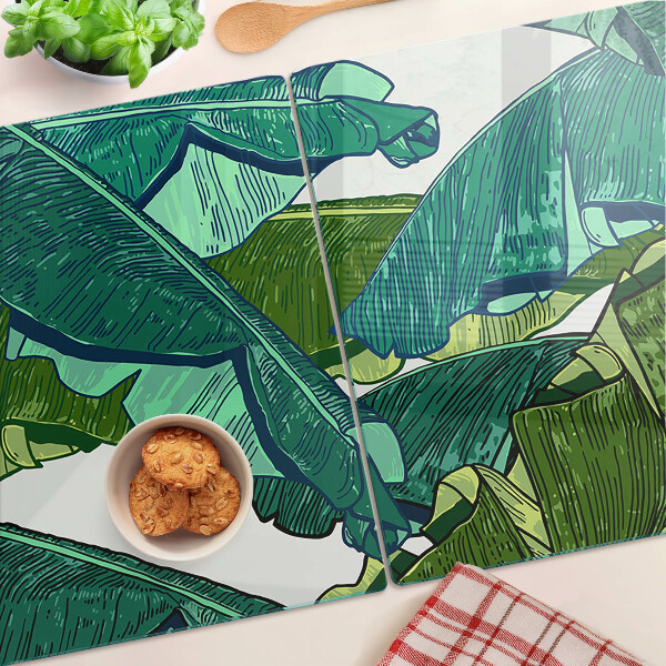 Tagliere in vetro con motivo di foglie di palma nei toni del verde