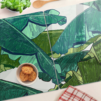 Tagliere in vetro con motivo di foglie di palma nei toni del verde