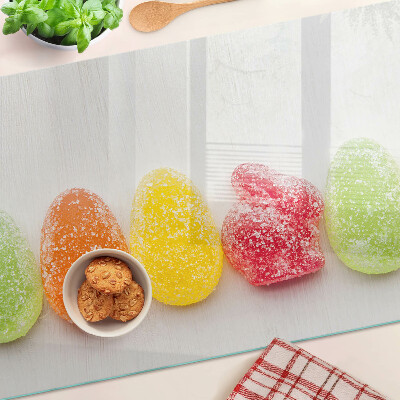 Tagliere in vetro temperato con decoro di dolci nei colori dell'arcobaleno