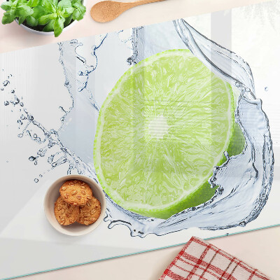 Tagliere in vetro temperato con stampa di limone immerso nell'acqua
