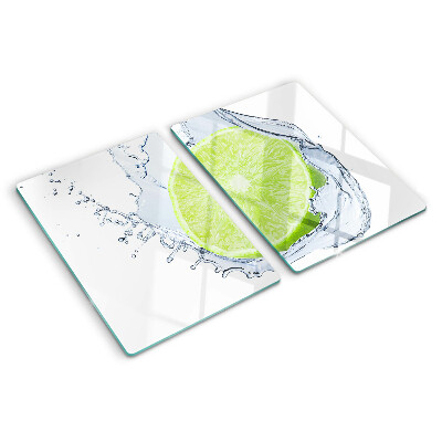 Tagliere in vetro temperato con stampa di limone immerso nell'acqua