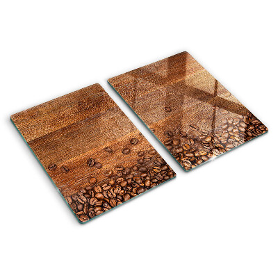 Tagliere in vetro temperato Chicchi di caffè su sfondo di legno