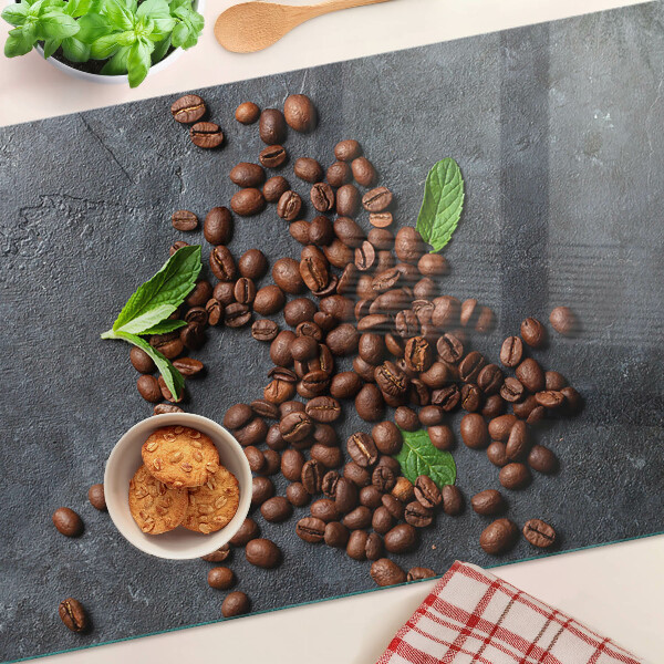 Tagliere in vetro con motivo di chicchi di caffè su sfondo effetto pietra