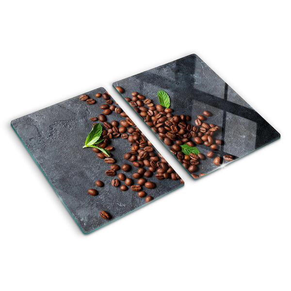 Tagliere in vetro con motivo di chicchi di caffè su sfondo effetto pietra