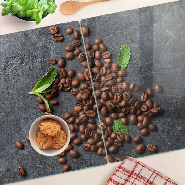 Tagliere in vetro con motivo di chicchi di caffè su sfondo effetto pietra